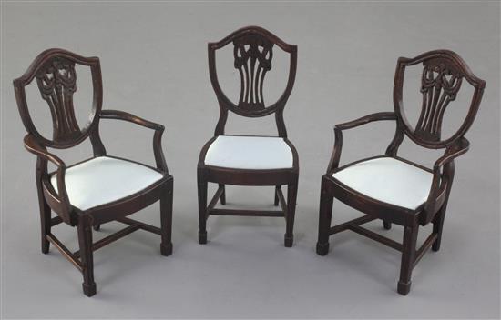 Denis Hillman. Three Hepplewhite style mahogany shield back miniature dining chairs, height 3.5in.